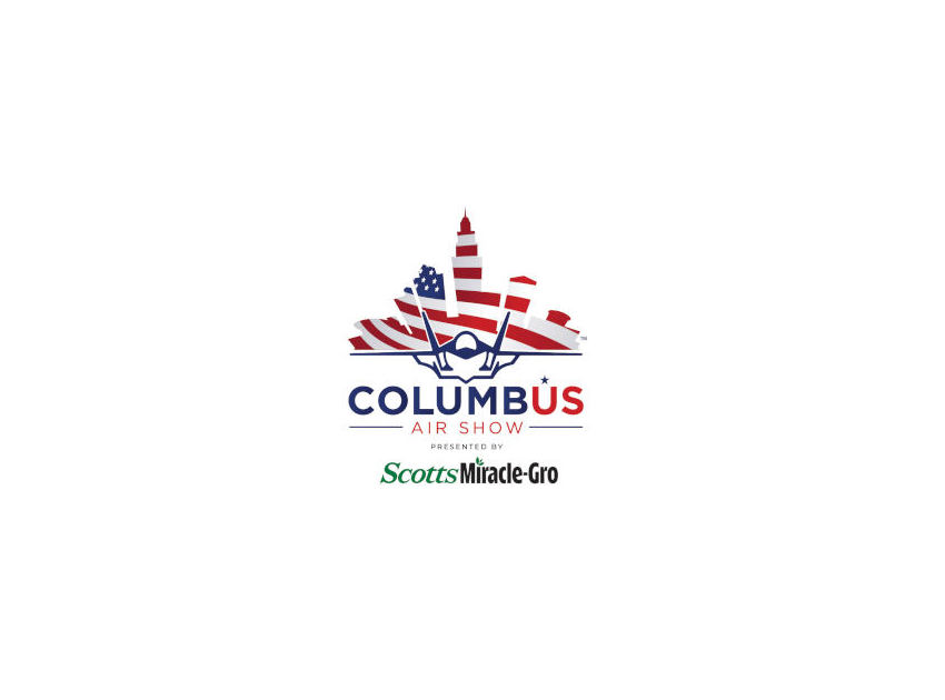 Fireworks bursting over an American flag with an America 250 Ohio emblem, representing a twilight air show and pyrotechnic celebration honoring 250 years of American independence.